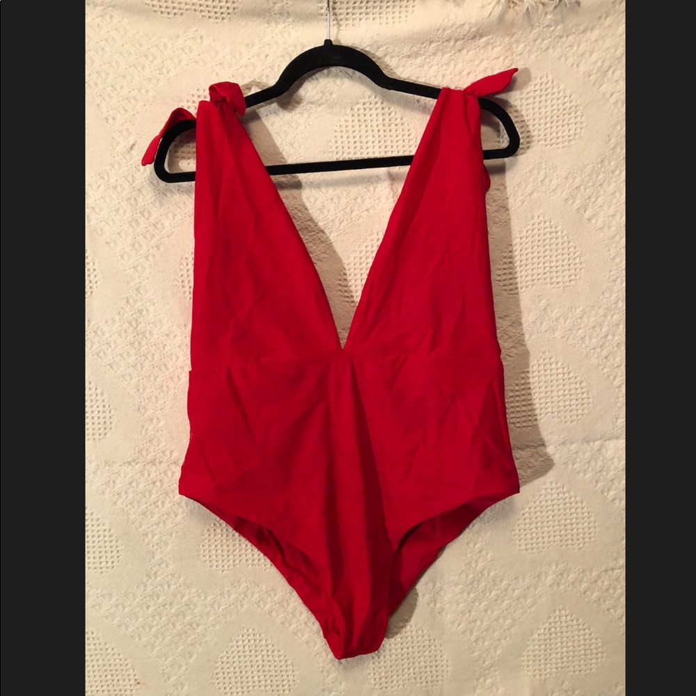 Red plunge one piece bathing suit, cheeky